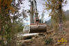 Pásové rypadlo Takeuchi TB1140 firmy Container Services