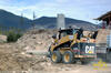 Smykem řízený nakladač Caterpillar 242B High Flow