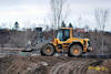 Kolový nakladač Volvo L60F firmy Zakládání staveb uhání k vrtné soupravě