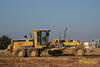 Grejdr Caterpillar 140H firmy Sedos stavby