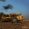 Skrejpr Caterpillar 627F firmy Havras