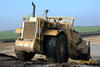 Skrejpr Caterpillar 627F zezadu