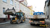 Traktorbagr Caterpillar 428 D a sklápěčka firmy Šumperská provozní vodohospodářská společnost