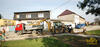 Rypadlonakladač Caterpillar 424D firmy Myfa Olomouc nakládá Tatru T 815