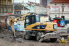 Kolové rypadlo Caterpillar M315D firmy Walco s kladivem Atlas Copco MB 1500 na rychloupínači Verachtert CW40
