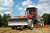 Grejdr O&K F156A Powerline firmy Strabag