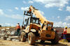 Teleskopický manipulátor Caterpillar TH460B-2
