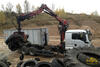 Marek Šilhavík obsluhuje hydraulickou ruku V-Kran V15Z na kontejnerovém nosiči MAN TGS 26.440