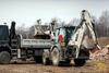Rypadlonakladač Terex 860 SX nakládá Iveco EuroTrakker 180E25