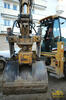 Rypadlonakladač Caterpillar 442D firmy Zempram I & J s naklápěcí hlavou Jurenka