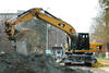 Kolové rypadlo Caterpillar M322D firmy Pragis