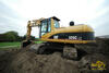 Těžba zeminy z odkalovacích lagun: Pásové rypadlo Caterpillar 325C LN