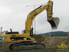 Pásové rypadlo Caterpillar 345C s max. výškovým dosahem 15,4m a dálkovým dosahem 16,5m