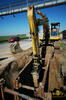 Pásové rypadlo New Holland Kobelco E235SR firmy Terrabau s kladivem Huppi 1902