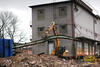 Pásové rypadlo Caterpillar 323D L s halovým nosníkem v drapáku Atlas Copco MG 1800