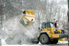 Kloubový dempr Komatsu HM400 - všimněte si vyhřívání korby
