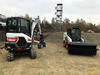 31. Bobcat E27 a smykem řízený nakladač Bobcat S450