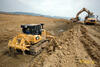 Dozer Caterpillar D7E na zemním tělese dálnice z Přerova do Lipníku nad Bečvou