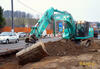 Pásové rypadlo Kobelco SK260NLC-9 se svahovací lopatou Empec