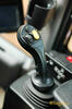 Multifunkční joystick nakladače
