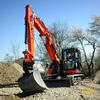 Kubota KX080-4 s dvoudílným výložníkem a naklápěcí hlavou Helac Powertilt PTA-08