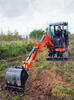 Kubota U27-4 nabírá materiál