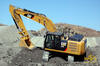 Pásové rypadlo Caterpillar 329E ve svahu
