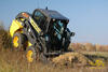 New Holland L220 zdolá náročný terén navzory velkému rozvoru