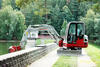 Takeuchi TB240 na přehradní hrázi v Blansku