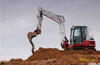 Rypadlo Takeuchi TB 290 sype materiál