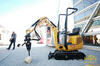 Pásové mikrorypadlo Caterpillar 300.9D s kladivem H29D
