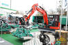 Pásové minirypadlo Kubota KX057-4 s pokladačem dlažby Hunklinger Twist
