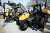 Otočný kolový nakladač Mecalac AS 700 s vrtacím zařízením AugerTorque Earth Drill 4500 Max