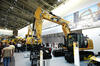 Pásové rypadlo Caterpillar 323E L s drapákem G315B-D