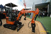 Pásové minirypadlo Hitachi Zaxis 17U s přídavným zařízením WOLF Lehnhoff MS 01 RockWheel