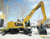Překládkové kolové rypadlo Caterpillar MH3024
