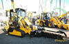 Pásový rypadlonakladač JCB 1CXT s rýhovačem JCB 625