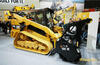 Pásový smykem řízený nakladač Caterpillar 299D2 s mulčovačem