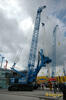 Souprava Soilmec SC-120 HD pro rotační vrtání na upraveném pásovém podvozku lanového rypadla s vrtákem pro velké průměry SA-40