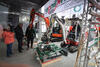 Hybridní pásové minirypadlo Takeuchi TB216 Hybrid s pokladačem dlažby Hunklinger