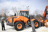 Kolový nakladač Doosan DL200TC-5 se sněhovou radlicí Giletta Bucher Arvel UMN32