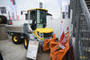Kompaktní kolový dempr Menzi Muck 65rd se sněhovou radlicí Hydrac U-III-320-C