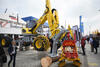 Kráčivé rypadlo Menzi Muck M545x s harvestorovou hlavou Woody 50