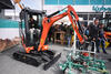 Pásové minirypadlo Kubota KX018-4 s pokladačem dlažby Hunklinger