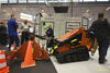 Pásový smykem řízený nakladač Ditch Witch s drážkovčem MT9 MicroTrench