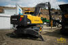Kolové rypadlo Volvo EW210C s hydraulickým kladivem Atlas Copco MB 1500 Dust Protector