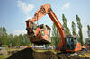Kolové rypadlo Doosan DX190W s třídicí lžící Allu