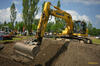 Pásové rypadlo Komatsu PC210 LCi-11 Intelligent Machine Control s integrovanou 3D GPS nivelací