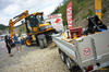 Kolové rypadlo JCB 110W s přídavným zařízením na přívěsu