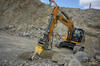Pásové rypadlo Liebherr se skalní frézou Atlas Copco DC 1200